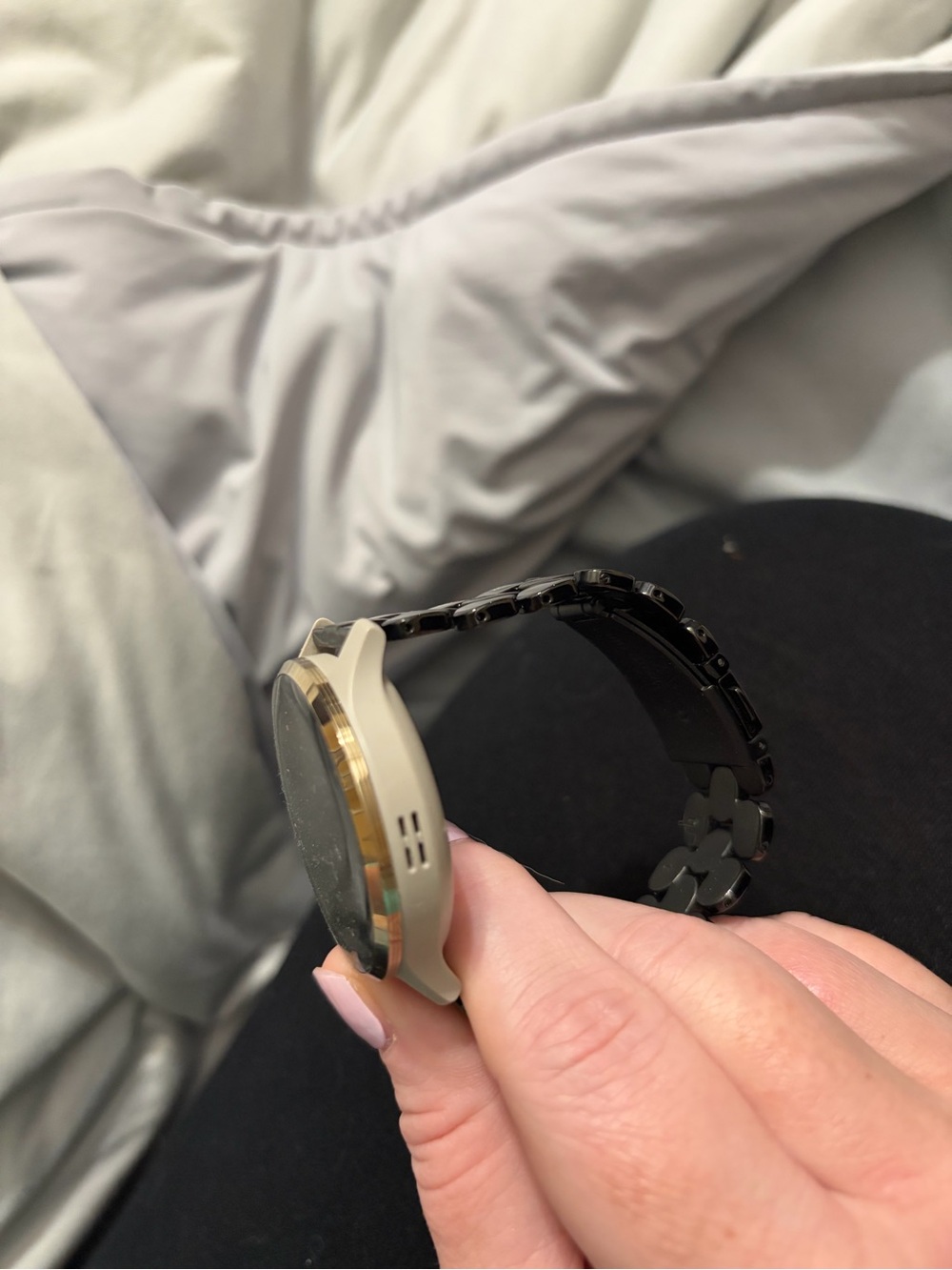 garmin smartwatch with beige case and black metal link band